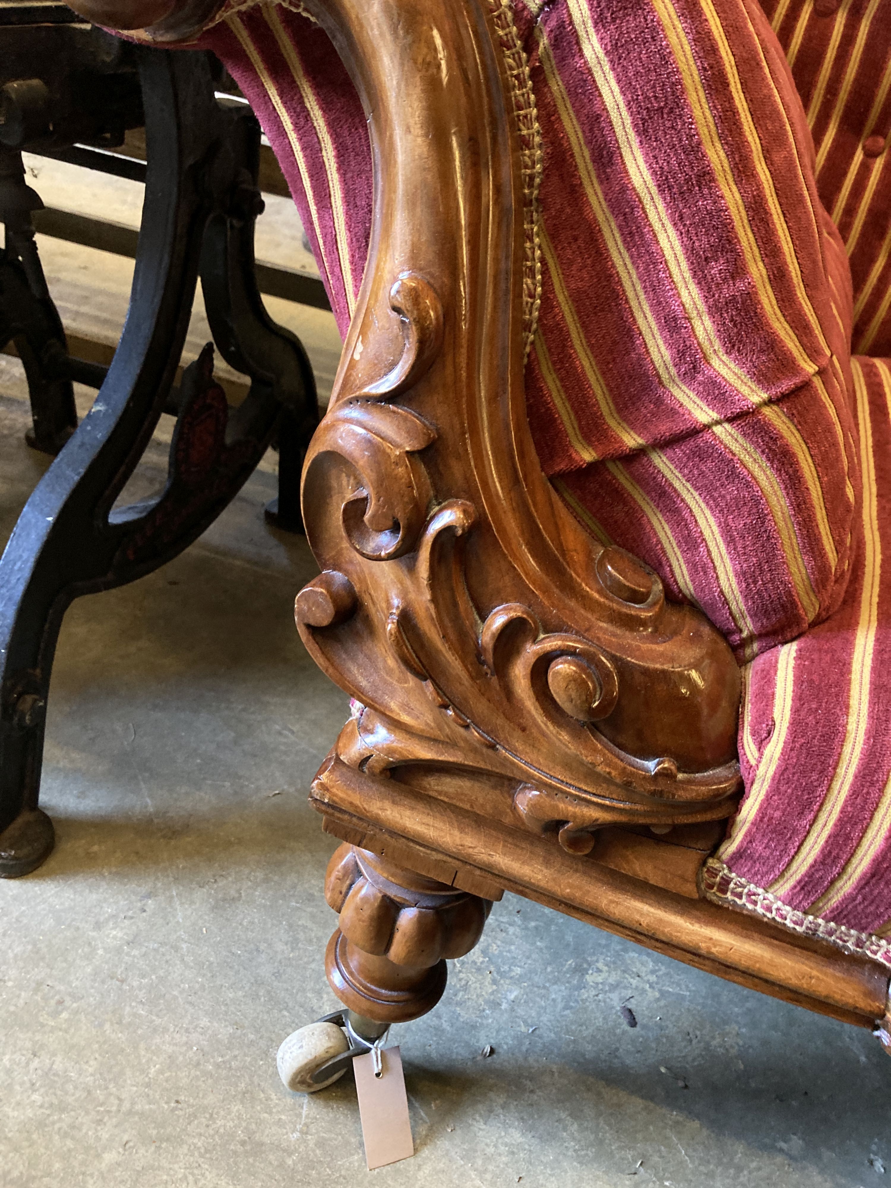 A Victorian carved walnut chaise longue, length 200cm, depth 74cm, height 88cm